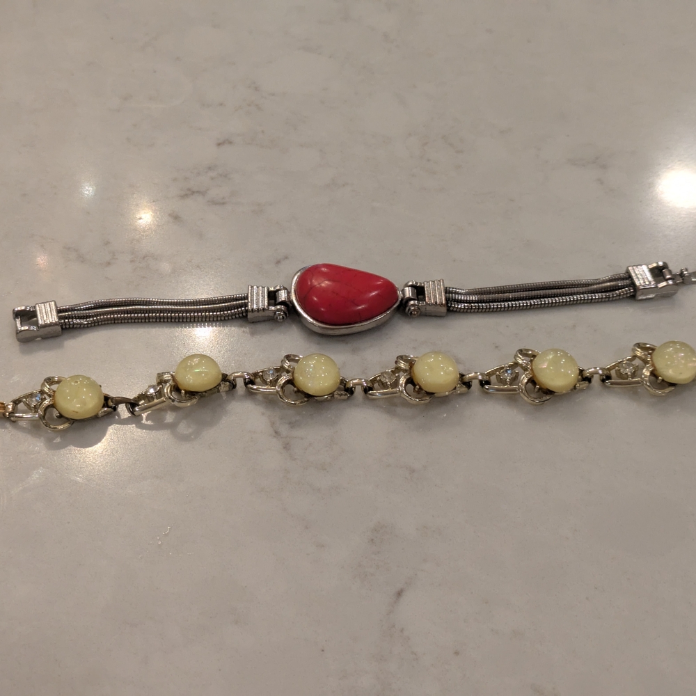 Vintage Chic Silver And Gold Tone Bracelets with Red and Yellow Accents.